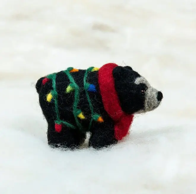 spectacled bear with lights