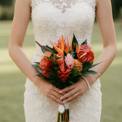 wedding bouquets prices tropical bouquet with pink ginger burgundy foliage striped tropical leaves green palms and sculptural bridal greenery