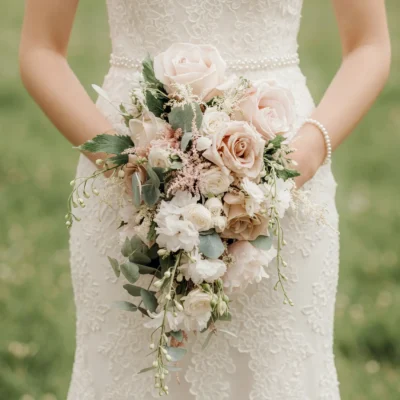 Pink Wedding Bouquet with blush garden roses, ivory roses, lisianthus, astilbe, eucalyptus, and cascading greenery for elegant bridal flowers bouquets