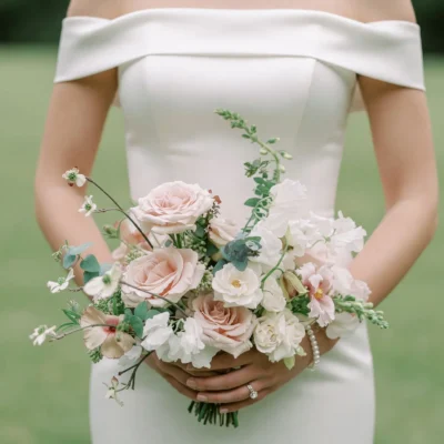 Pink Wedding Bouquet bridal flowers bouquets with blush roses, white lisianthus, ivory spray roses, sweet peas, and eucalyptus foliage
