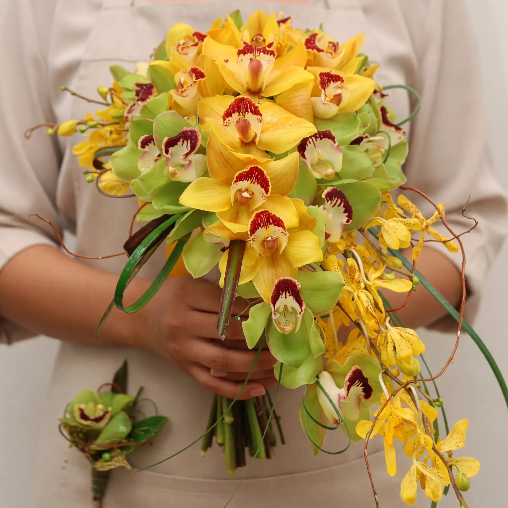 Golden orchid cascading bridal bouquet