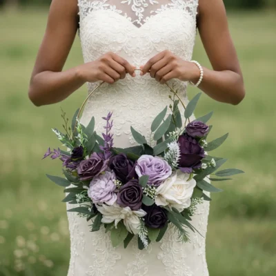 Purple Wedding Bouquets arranged on a gold floral hoop with plum roses, lavender blooms, ivory flowers and fresh greenery