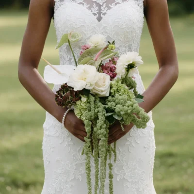 Green Wedding Bouquets with white roses, green hydrangeas, white anthuriums, blush flowers, and cascading green amaranthus