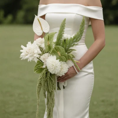 Green Wedding Bouquets with white dahlias, ivory roses, white and green anthuriums, cascading amaranthus, and fresh botanical greenery