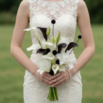 Popular wedding bouquets with white and black calla lilies, green buds, and dark floral accents for a modern bride