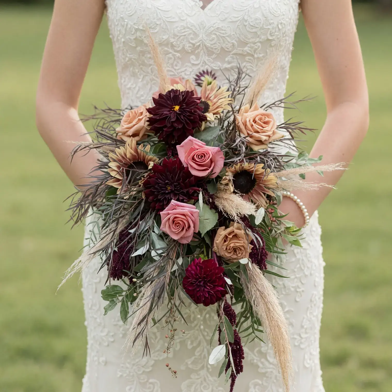 Popular wedding bouquets with burgundy dahlias, dusty pink and caramel roses, eucalyptus, pampas grass, and textured autumn greenery