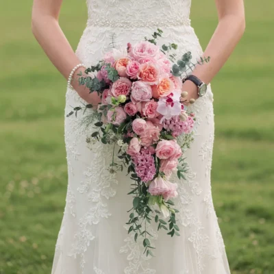 popular wedding bouquets with blush roses pink peonies orchid flowers hydrangea and cascading eucalyptus for a romantic garden bride