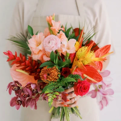 wedding flowers cost inspiration with coral tropical flowers red roses burgundy orchids golden blooms and lush greenery for a modern bride
