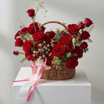 Rose basket Vancouver arrangement available in pink, white, peach, light pink and red roses with greenery and delicate white accents